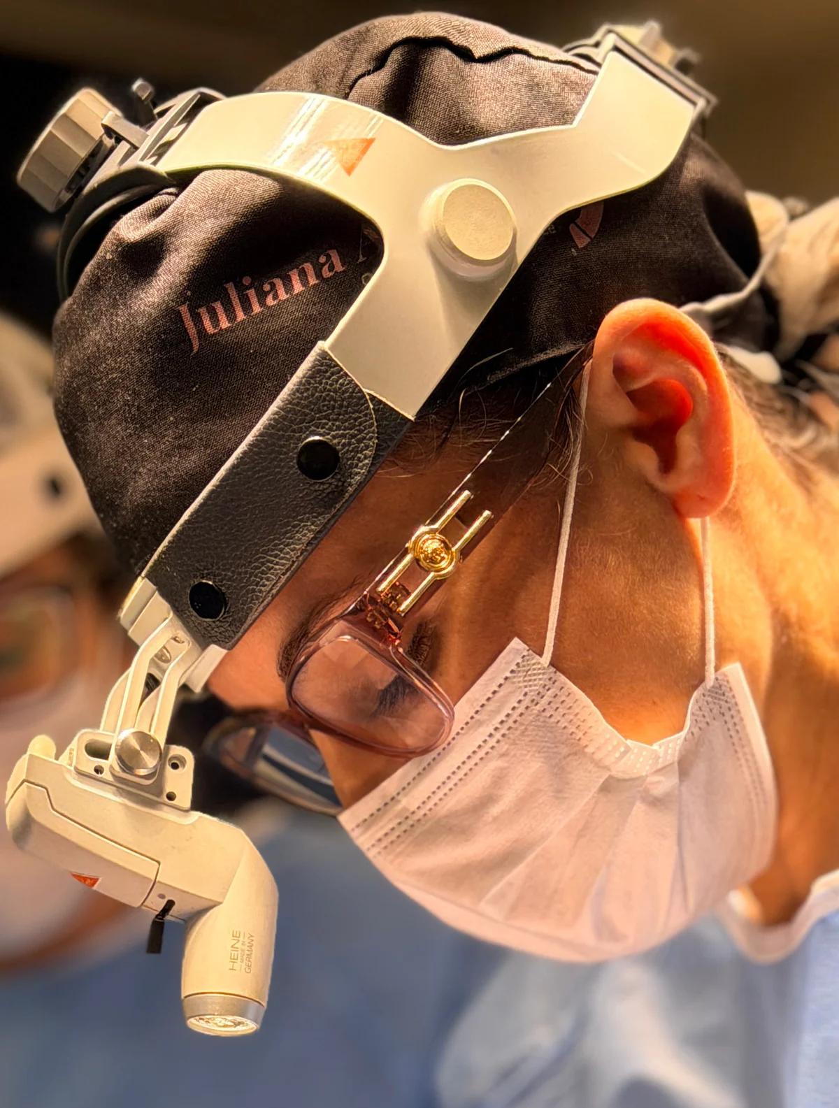Dr. Juliana performing a surgical procedure.