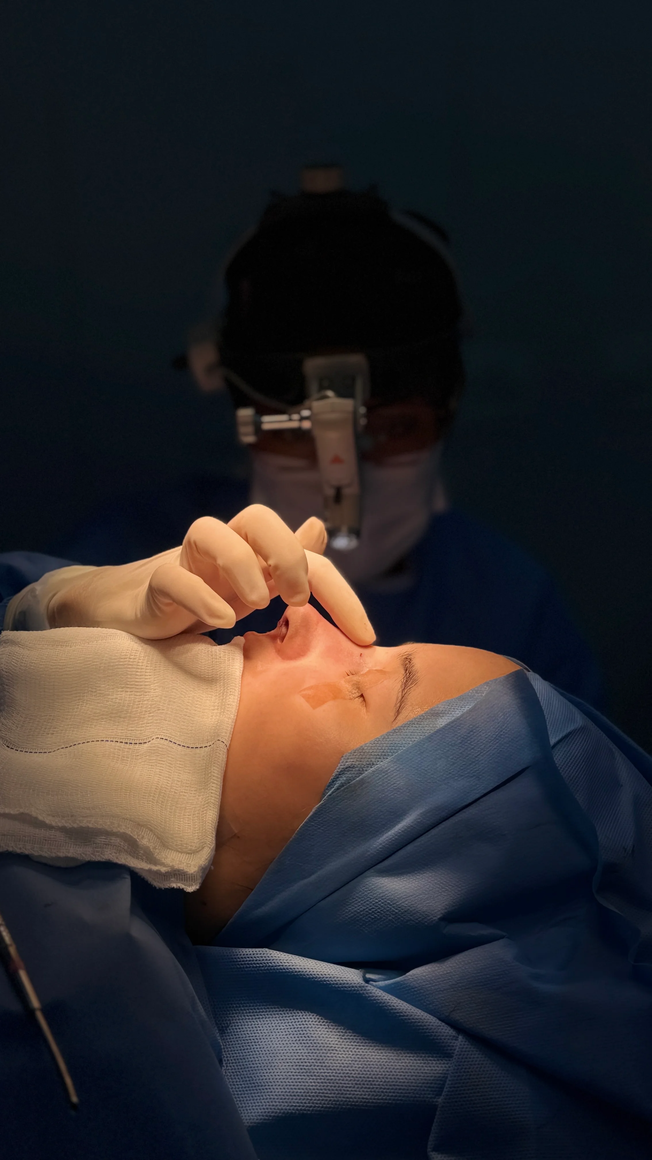 Dr. Juliana performing a surgical procedure.